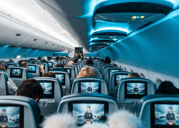 How To Get Free Flight Upgrades To Business Class: A Complete Travel Guide